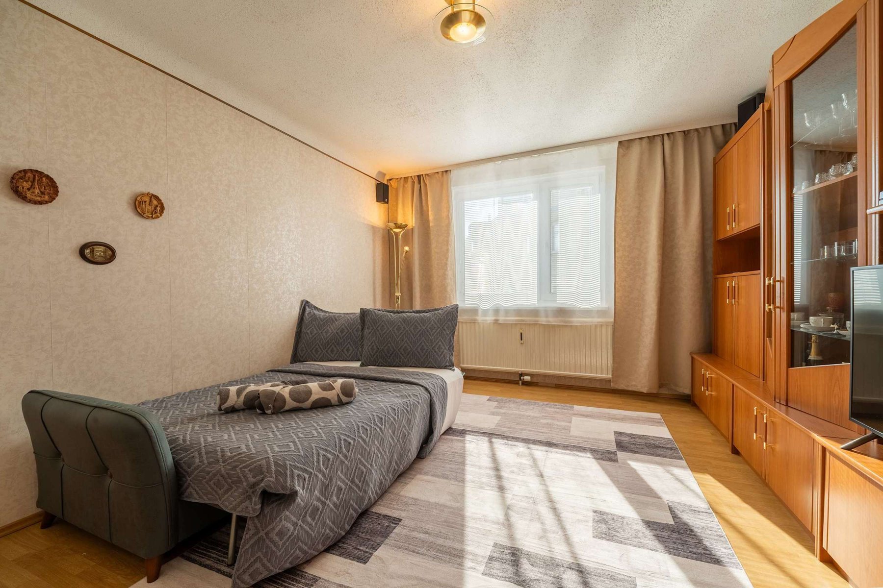 Cozy Living Room with Plush Seating & Smart Entertainment - Ideal for Evenings In or Movie Nights
