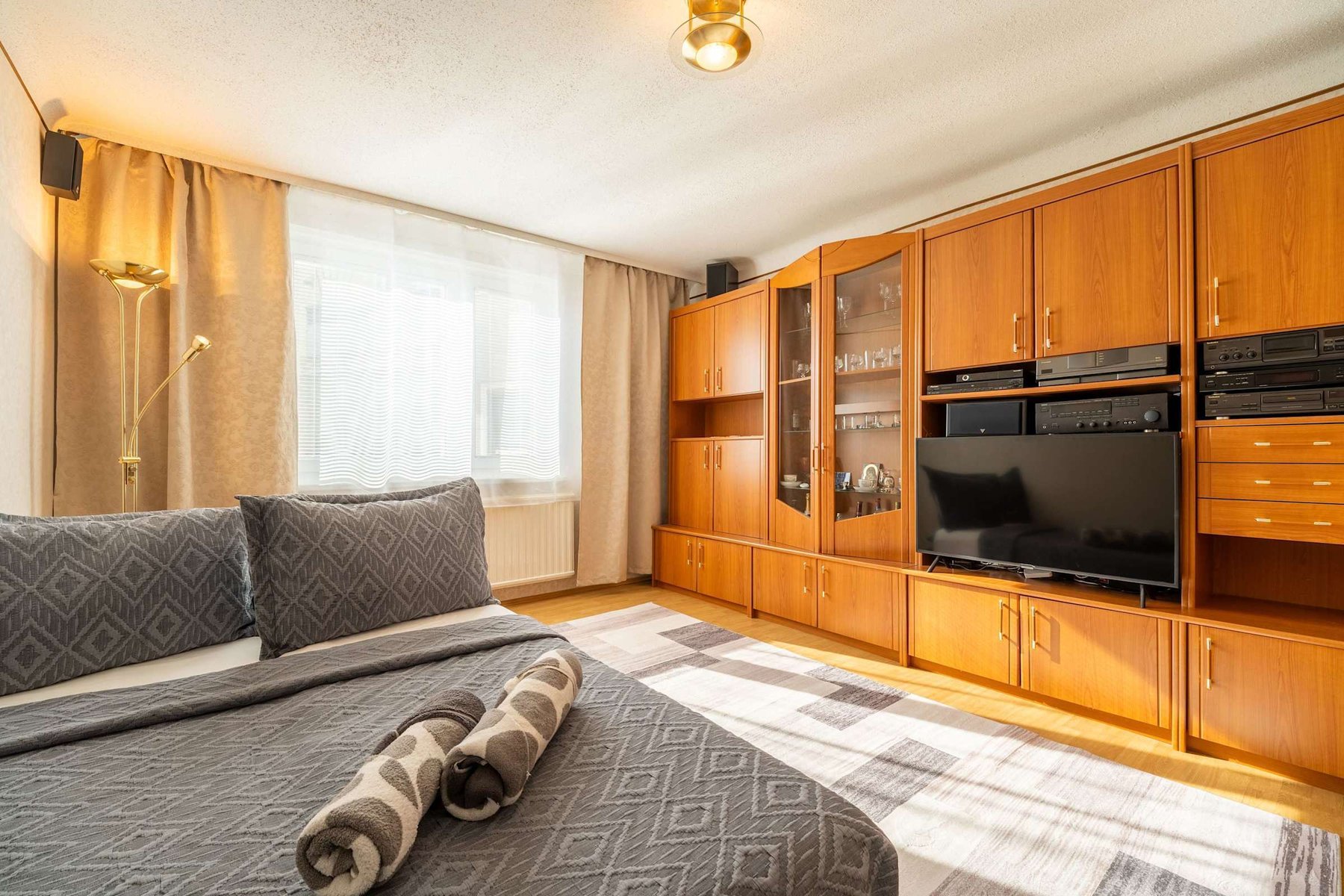 Cozy Living Room with Plush Seating & Smart Entertainment - Ideal for Evenings In or Movie Nights