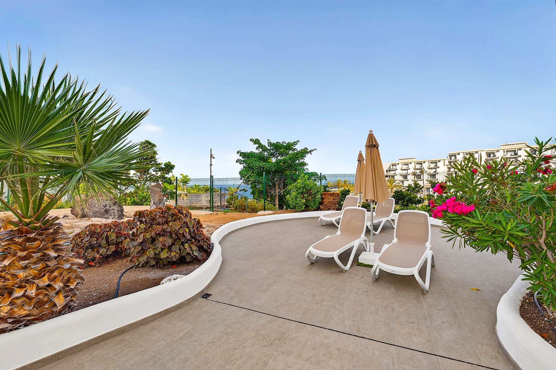 Poolside Views of the Apartment Complex – Comfortable Tenerife Accommodation