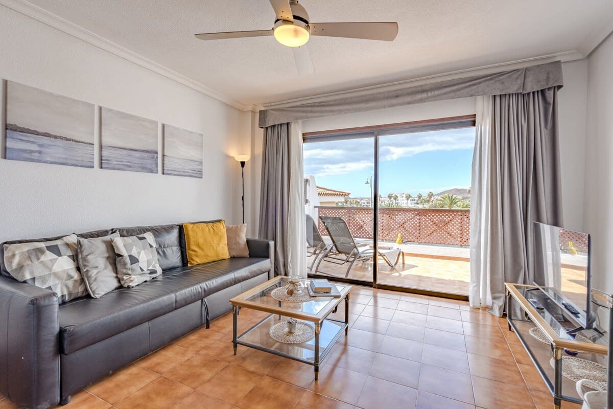Living Room with Sitting, Bar & Dining Area, TV, Ceiling Fan & Views
