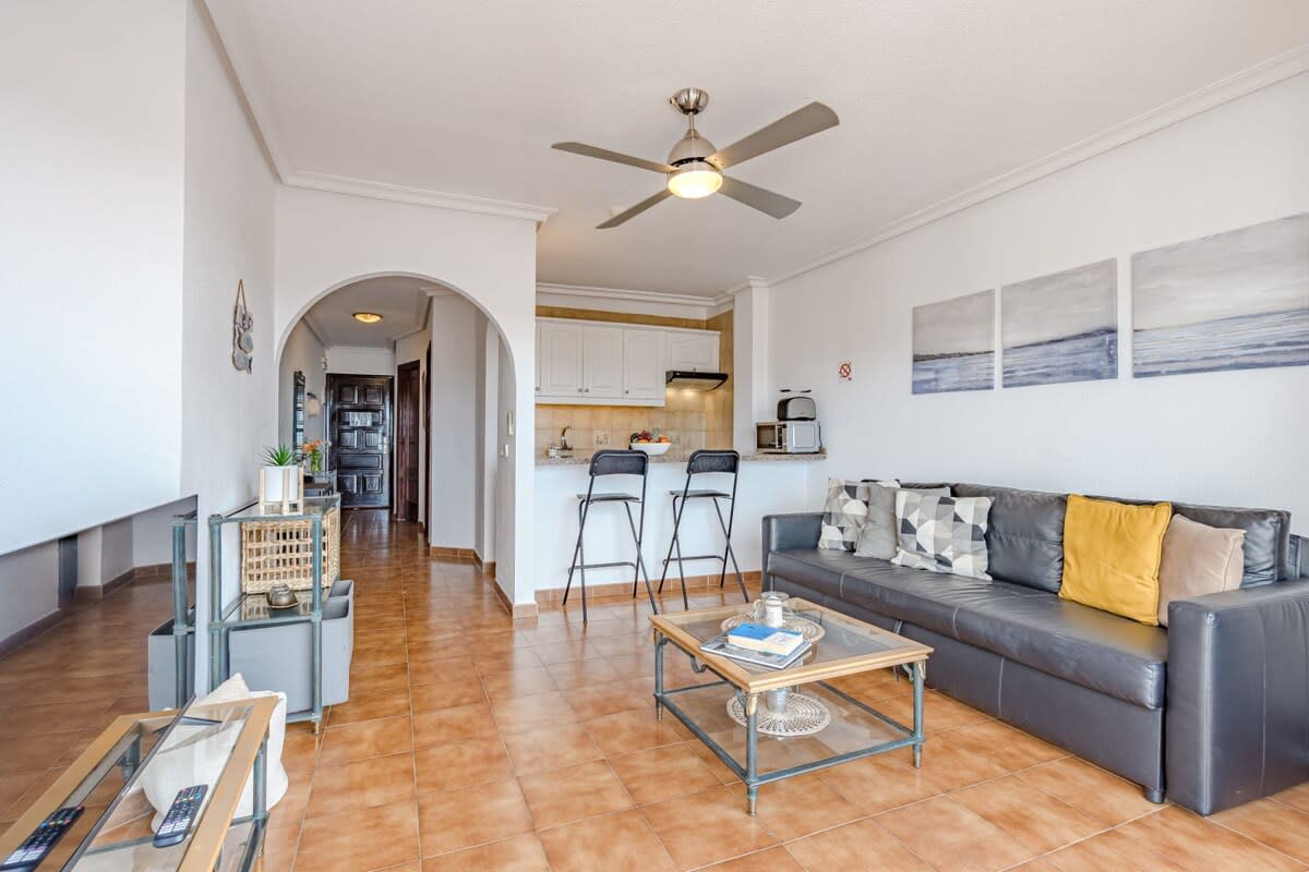 Living Room with Sitting, Bar & Dining Area, TV, Ceiling Fan & Views
