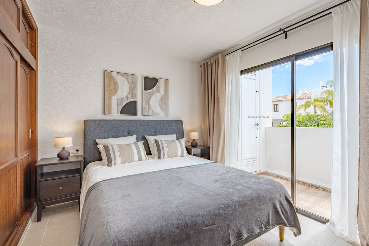 Master Bedroom with Queen-size Bed, TV, Wardrobe, Desk & AC