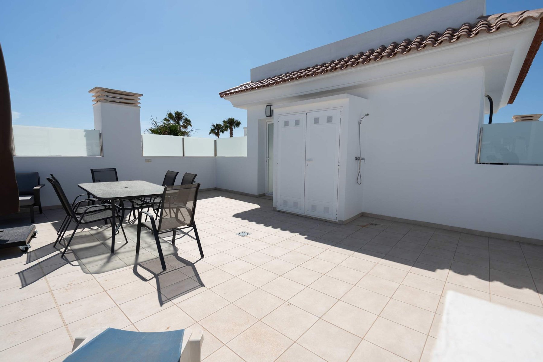 Terrace with Dining table, Sun loungers and Sun Umbrella