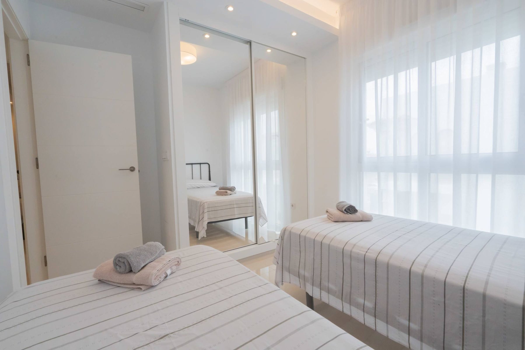 2nd Bedroom with 2 Single Beds and Closet