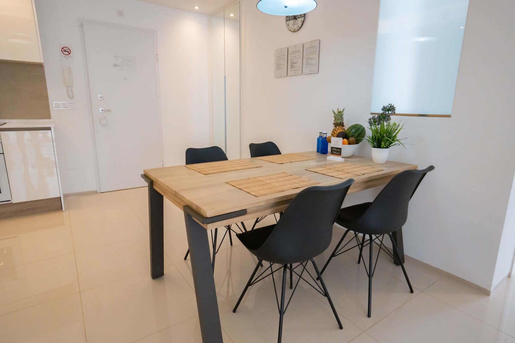 Kitchen with Dining Table, Oven, Stovetop, Microwave, Dishwasher, Fridge and Toaster