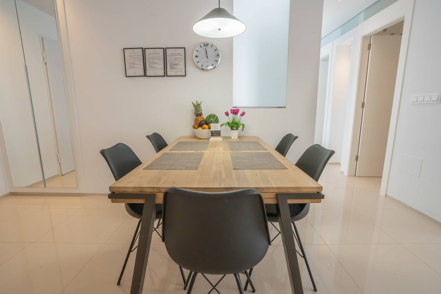 Kitchen with Dining Table, Oven, Stovetop, Microwave, Dishwasher, Fridge and Toaster