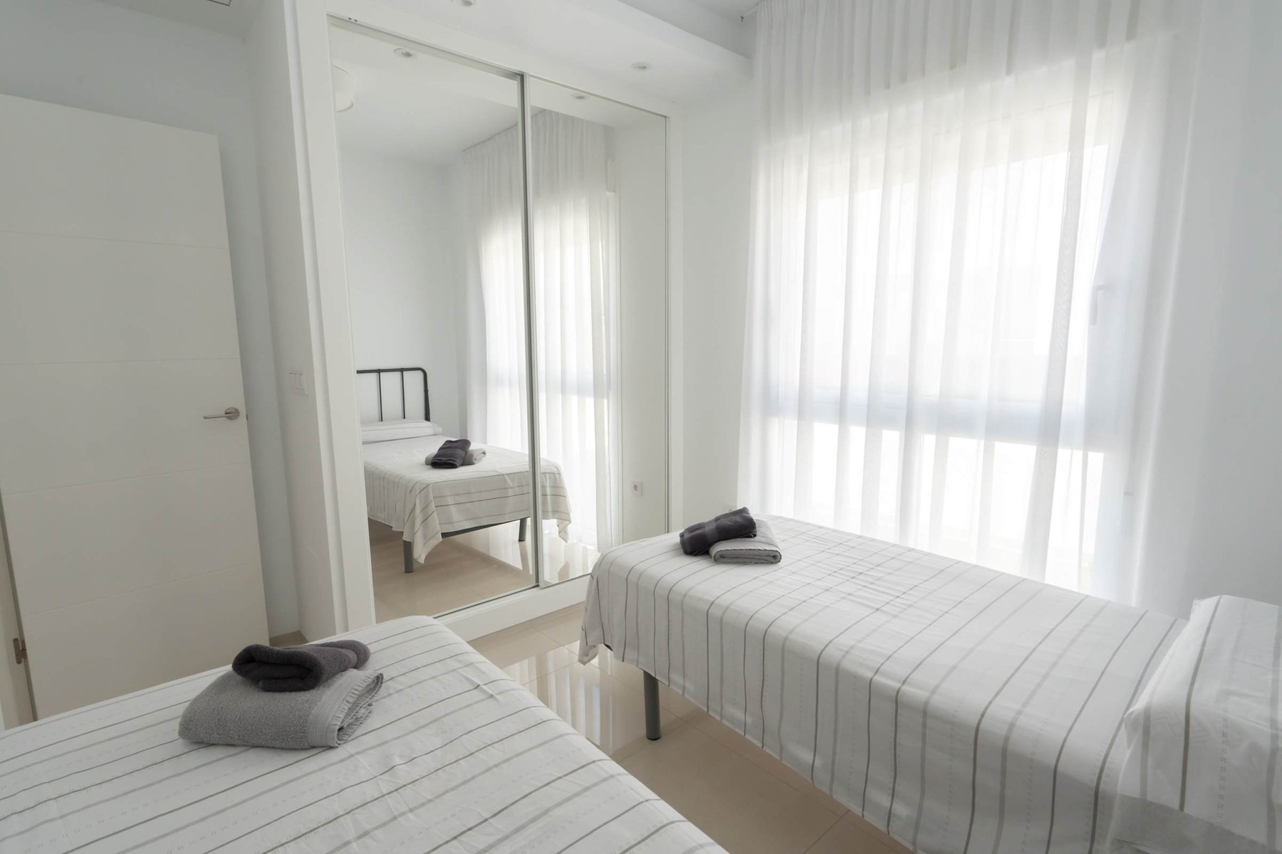 2nd Bedroom with 2 Single Beds and Closet