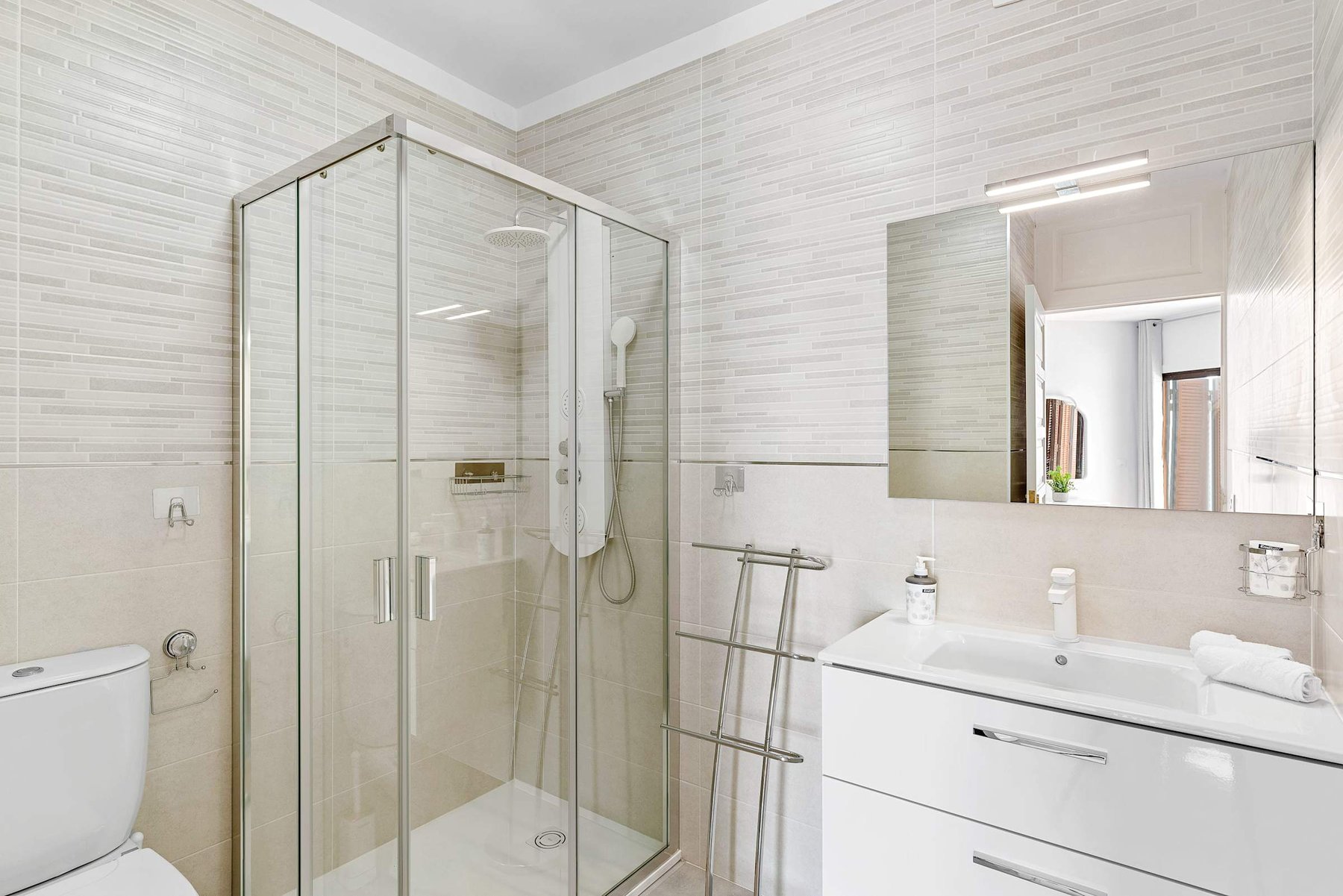 Bathroom with Toilet, Multi-Jet Shower and Sink