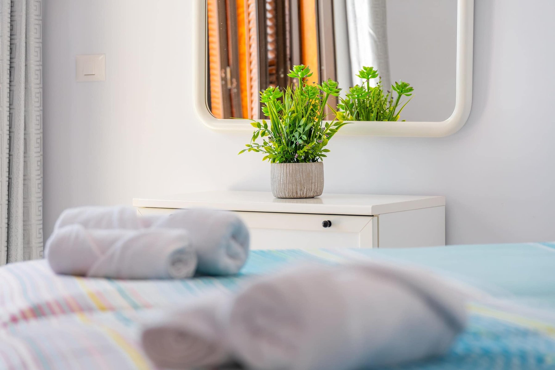 Bedroom with two Single Beds, Desk, Flatscreen TV, Wardrobe and Balcony Access