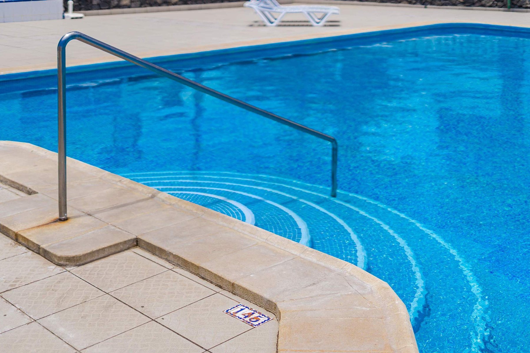 Year-Round Pool Area with Ocean Views & Sunbeds 