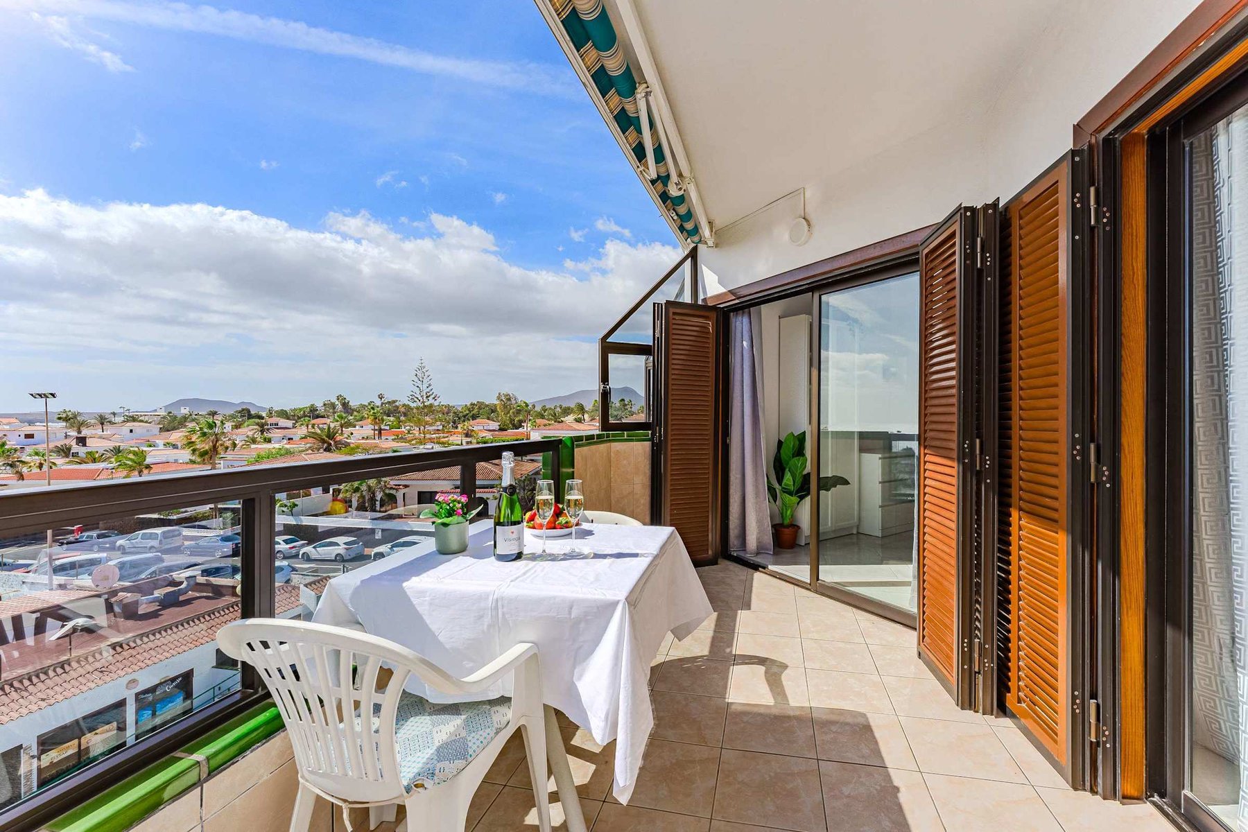 Balcony with Ocean View, Sun Loungers, Dining Table and Chairs