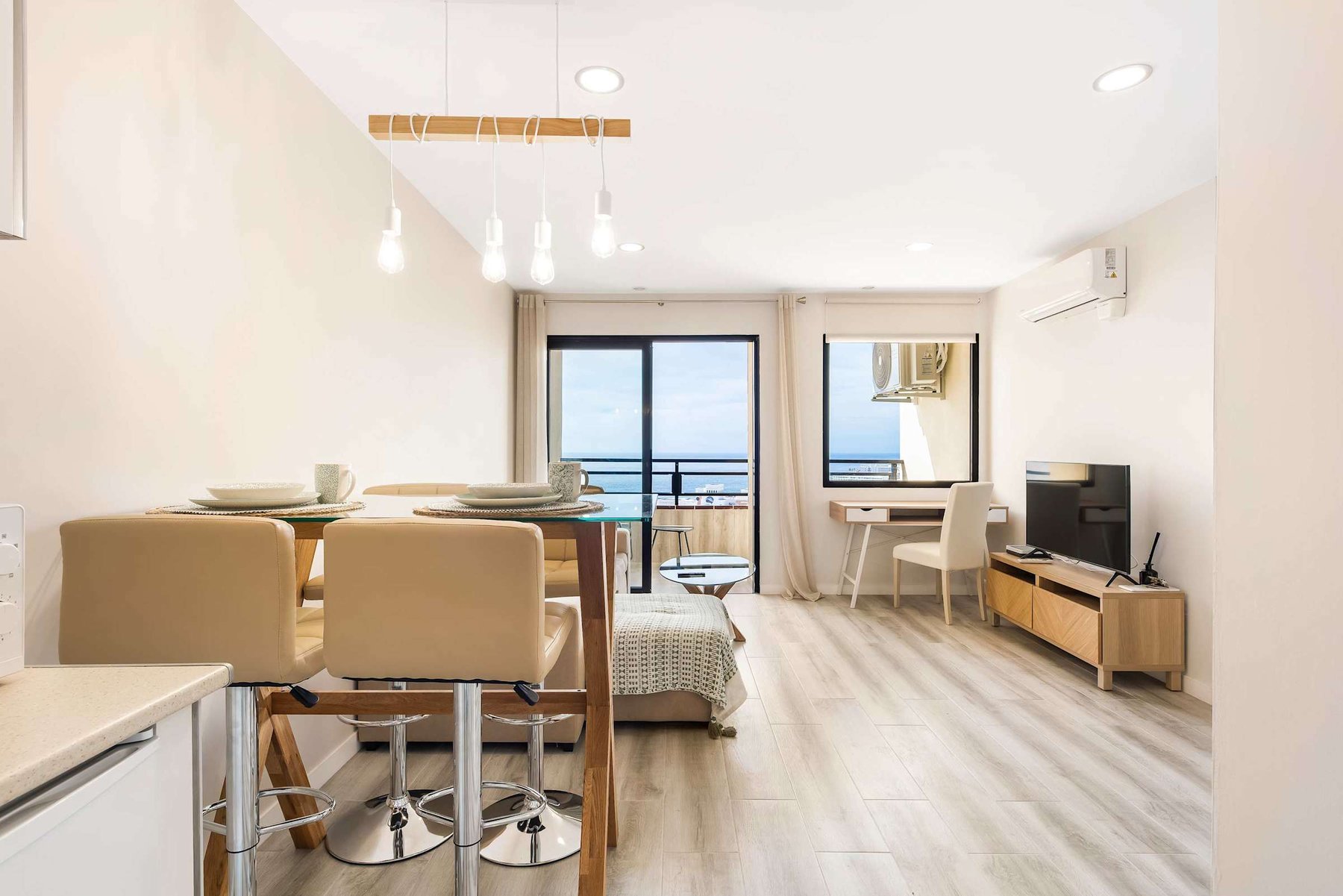 Living Room with Dedicated Working Area, Dining Area, Seating Area, Apple TV & Sonos Sound System
