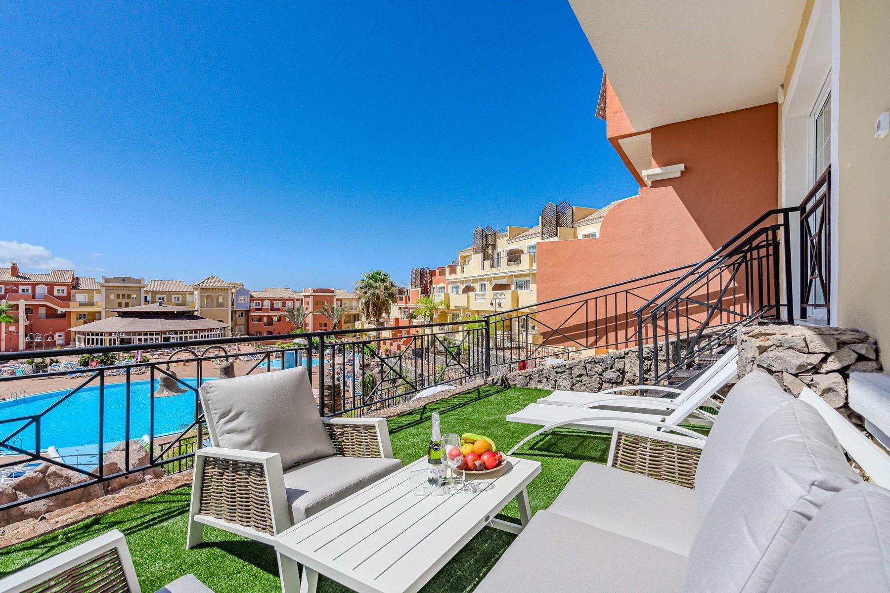 Patio with Outdoor Seating and Dining Area, Sun Lounger and Pool View