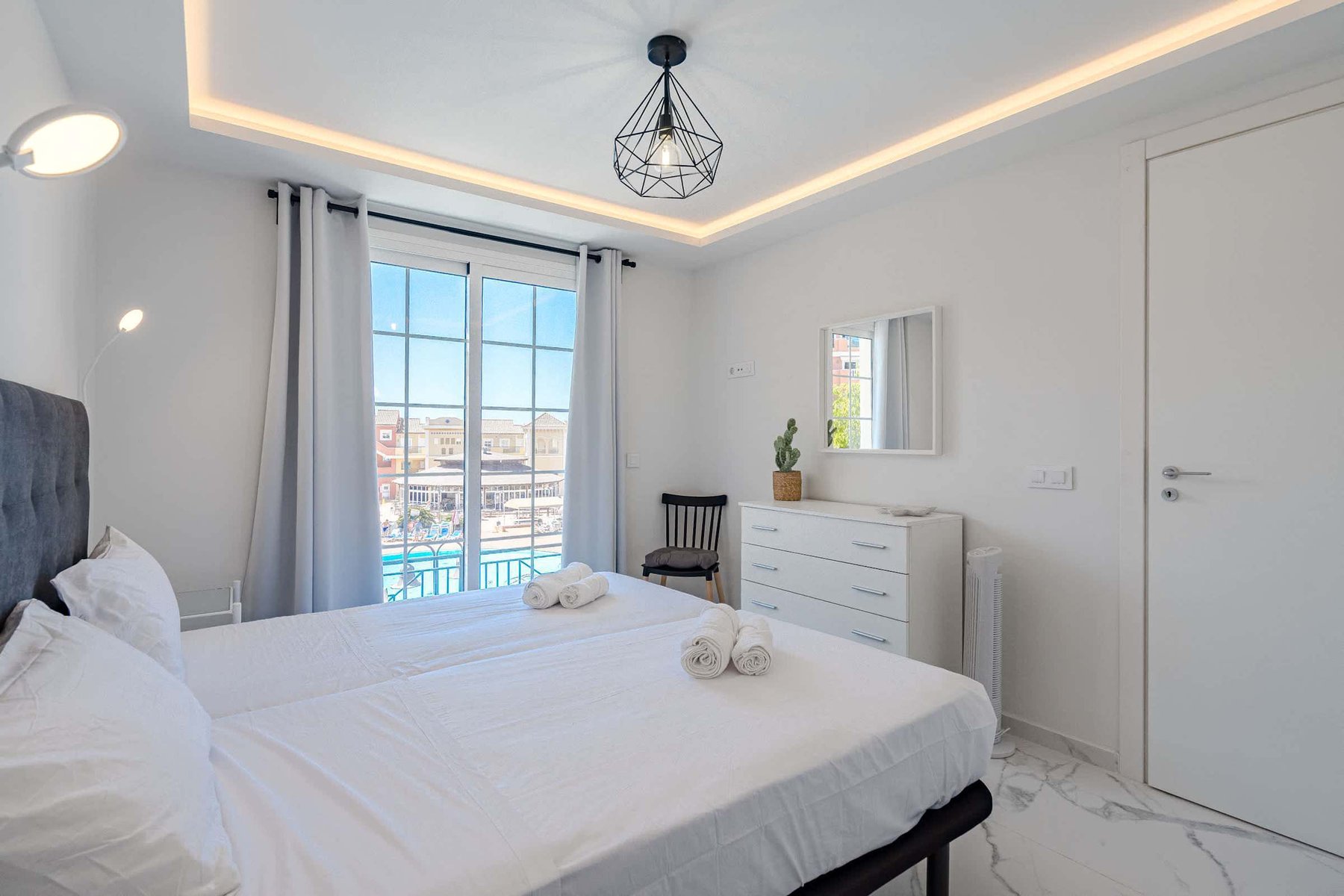 Main Bedroom with Double Bed, Wardrobe, Room Darkening Shades and Pool View