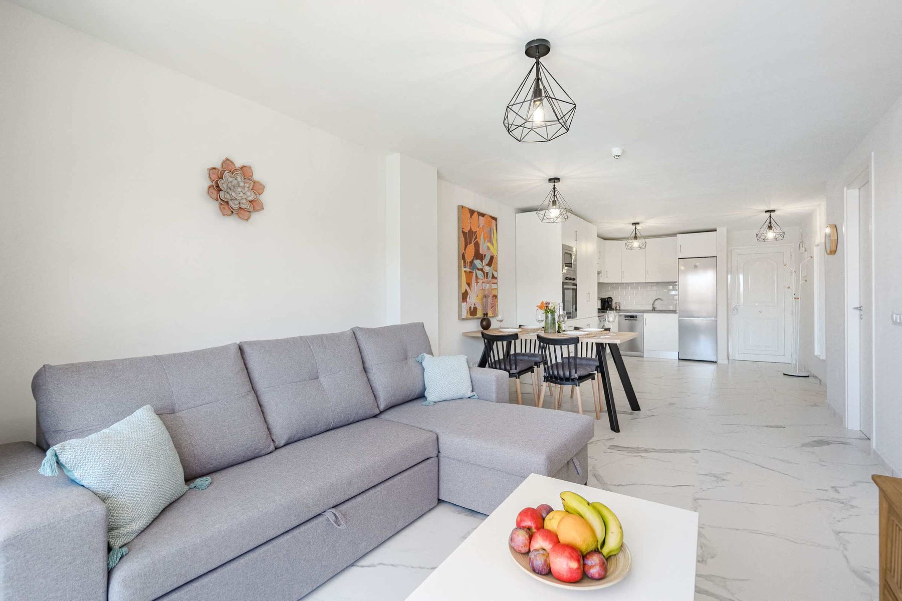 Living Room with TV, Sofa Bed, Dining Table, Coffee Table and Pool View