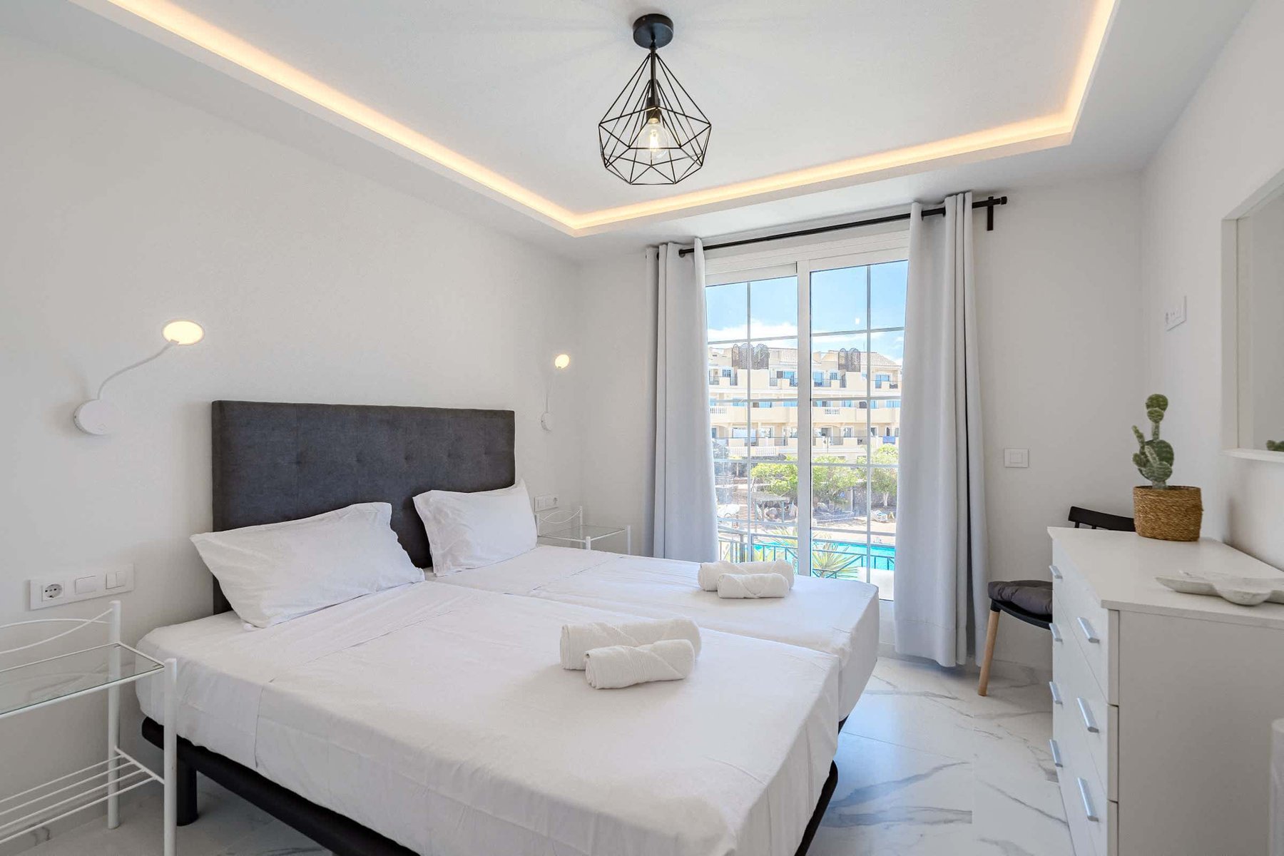 Main Bedroom with Double Bed, Wardrobe, Room Darkening Shades and Pool View