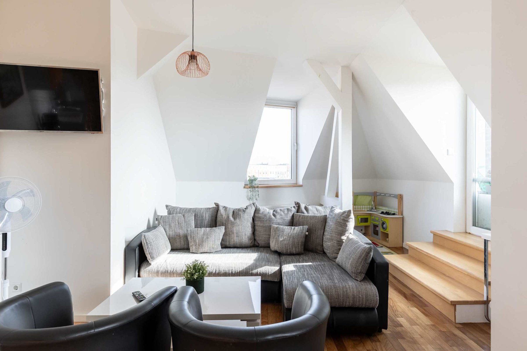 Living Area with Sofa-Bed, Armchairs, TV & Kids Play-Corner
