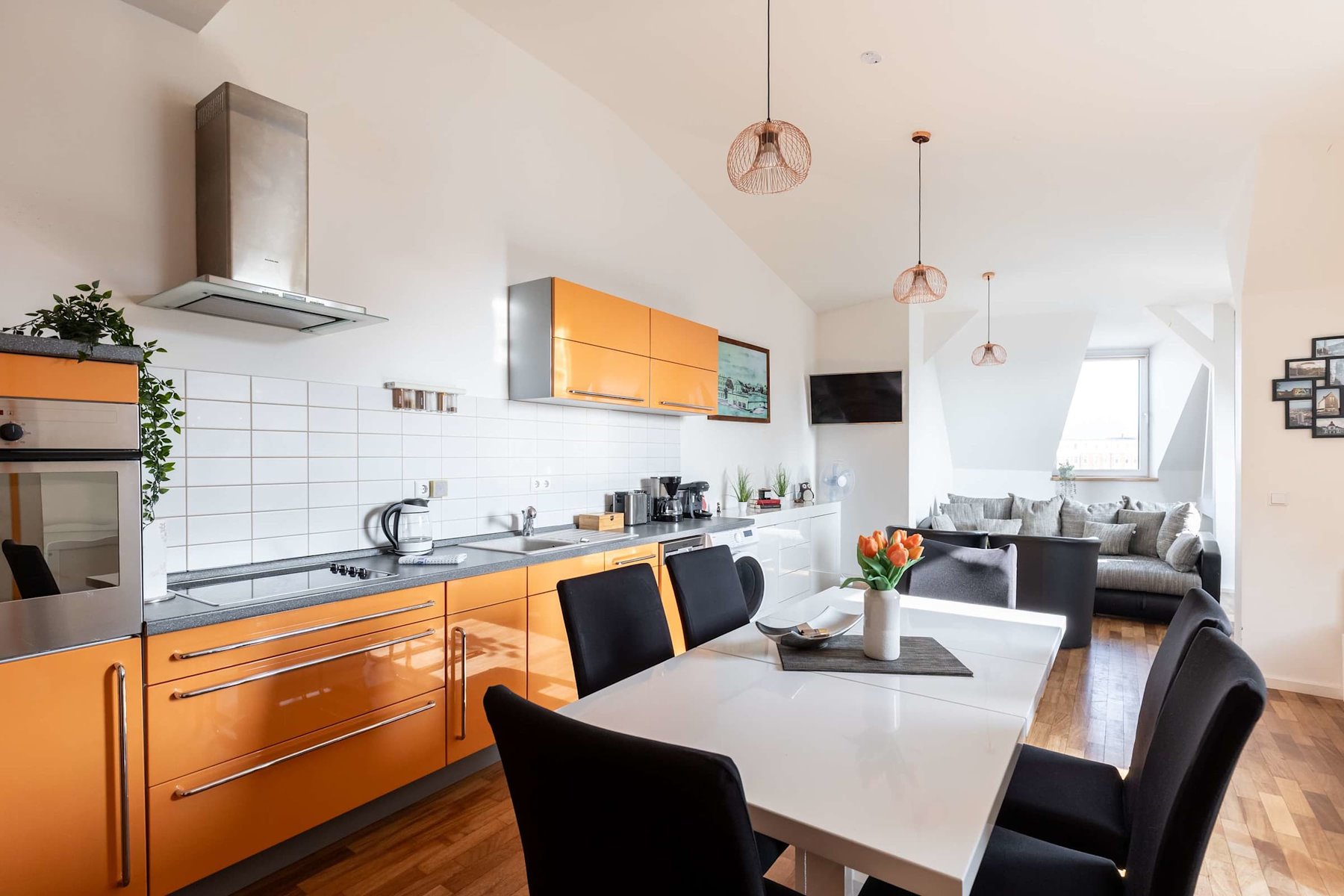 Living Area with Kitchen, Dining-table & Sofa-Bed