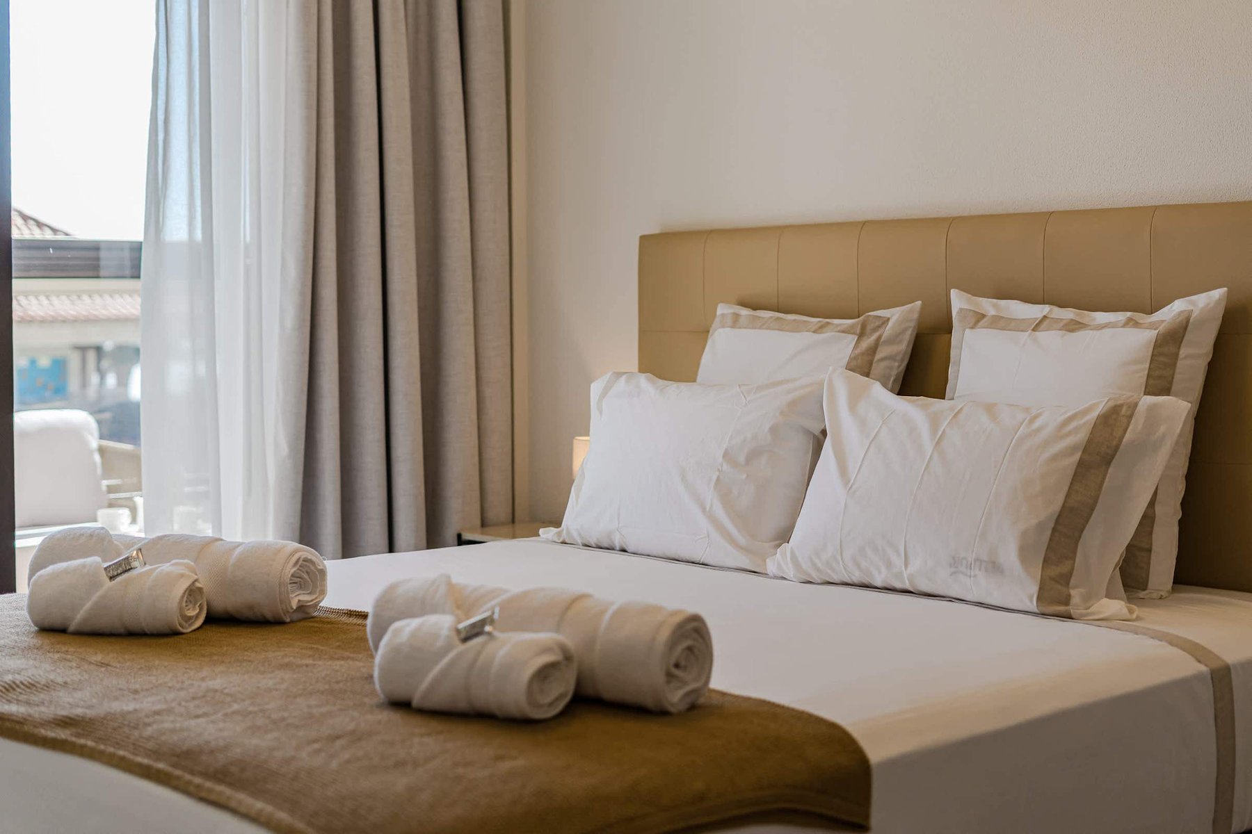Serene Bedroom with King-Size Bed, Premium Linens, Terrace Access and Wall-Mounted Flatscreen with Integrated Sonos Sound