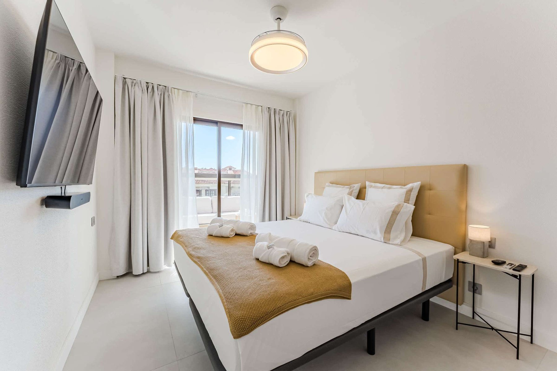 Serene Bedroom with King-Size Bed, Premium Linens, Terrace Access and Wall-Mounted Flatscreen with Integrated Sonos Sound