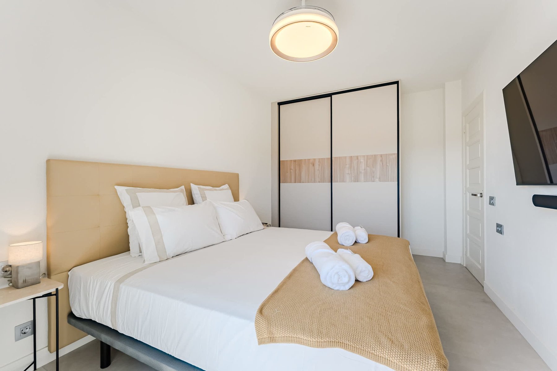 Serene Bedroom with King-Size Bed, Premium Linens, Terrace Access and Wall-Mounted Flatscreen with Integrated Sonos Sound