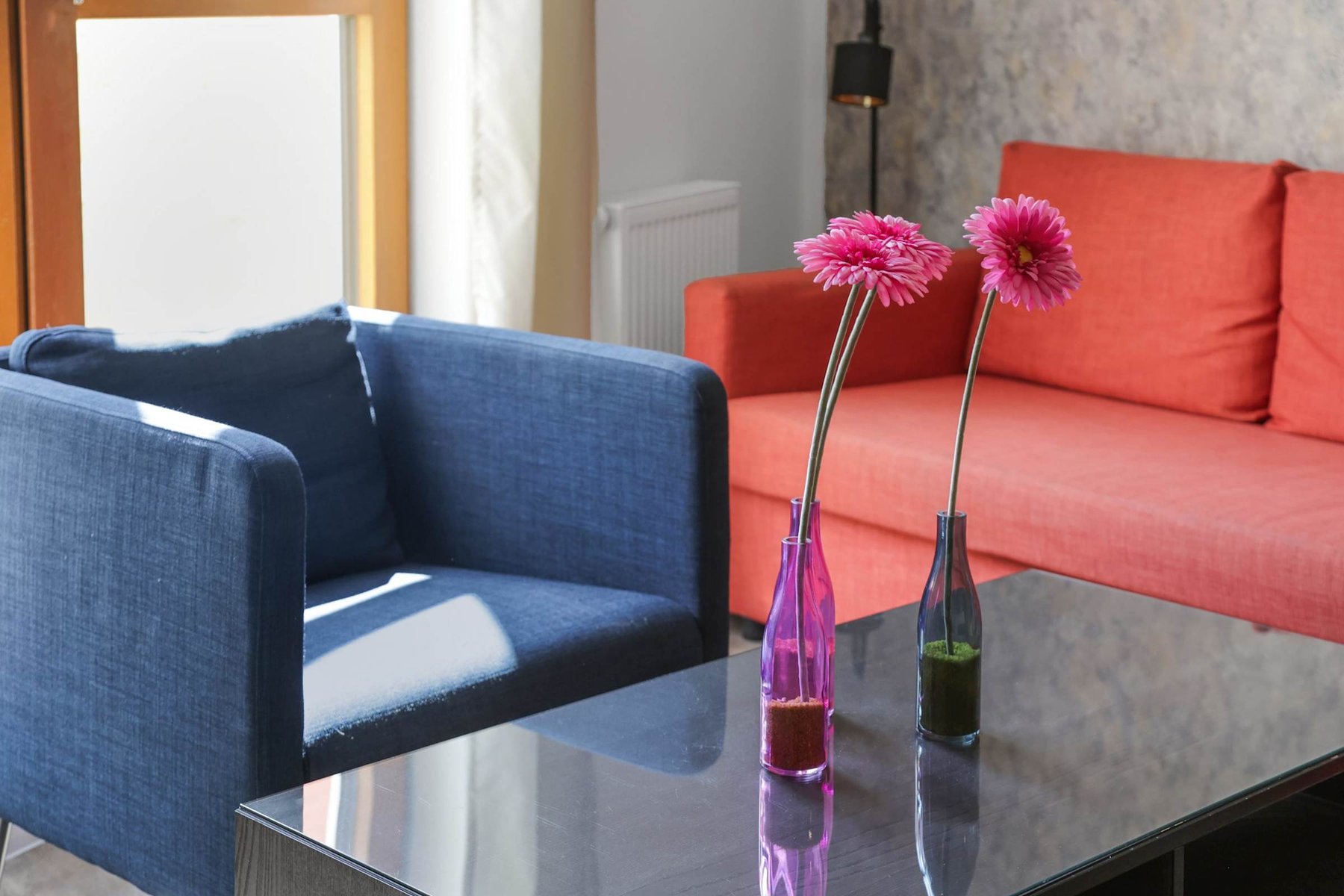 Chic Lounge Area with Bold Colours & Natural Light | Perfect for Reading or Relaxing