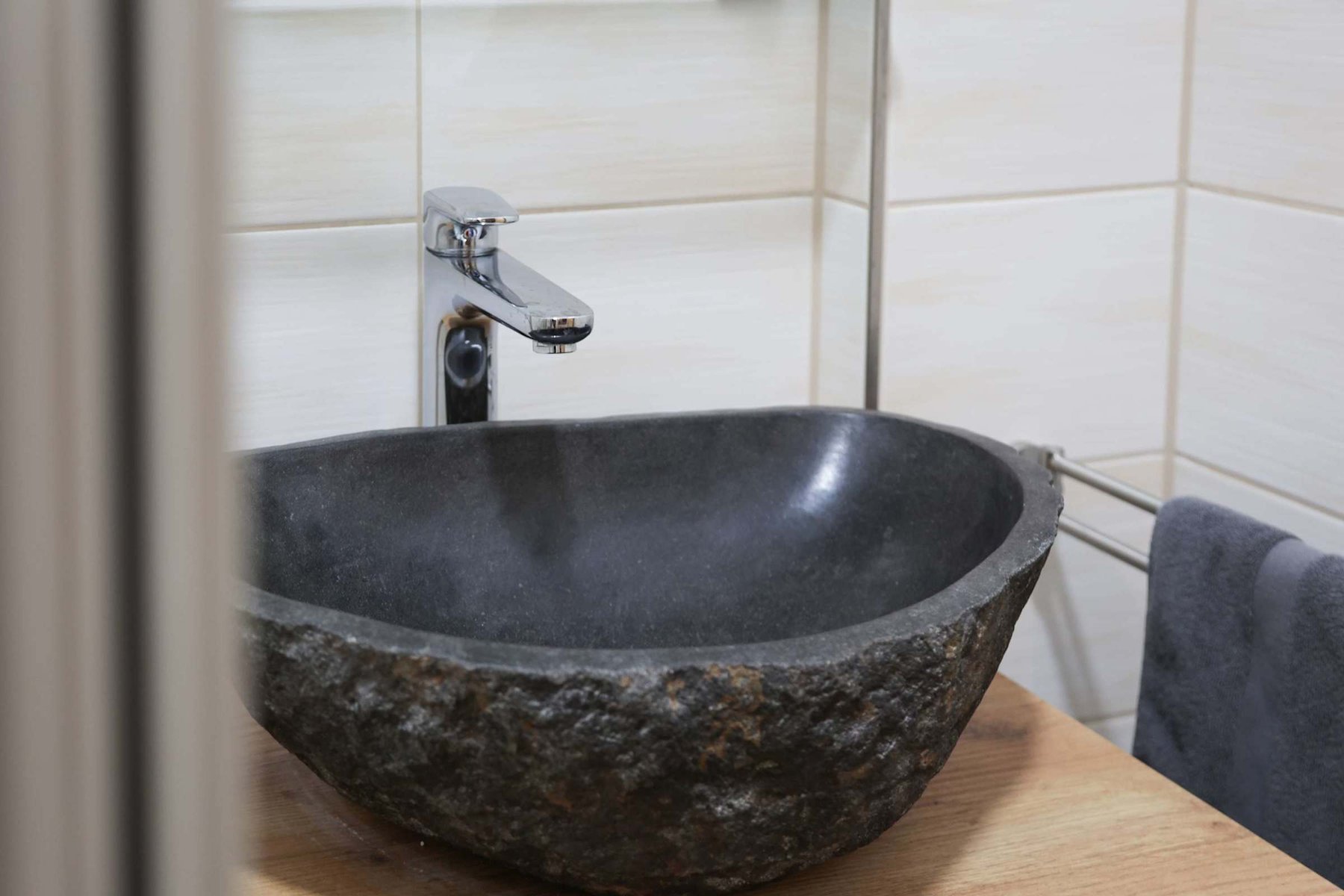 Unique Stone Basin in Modern Bathroom | Elegant Design for a Spa-Like Experience