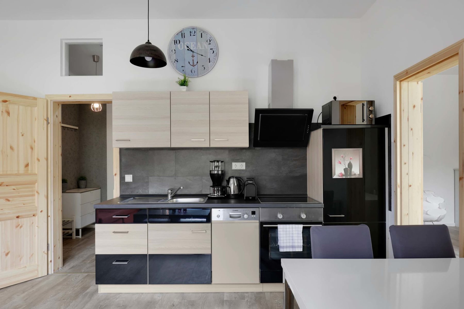 Modern Kitchenette with Coffee Maker, Microwave & More | Everything You Need to Dine In