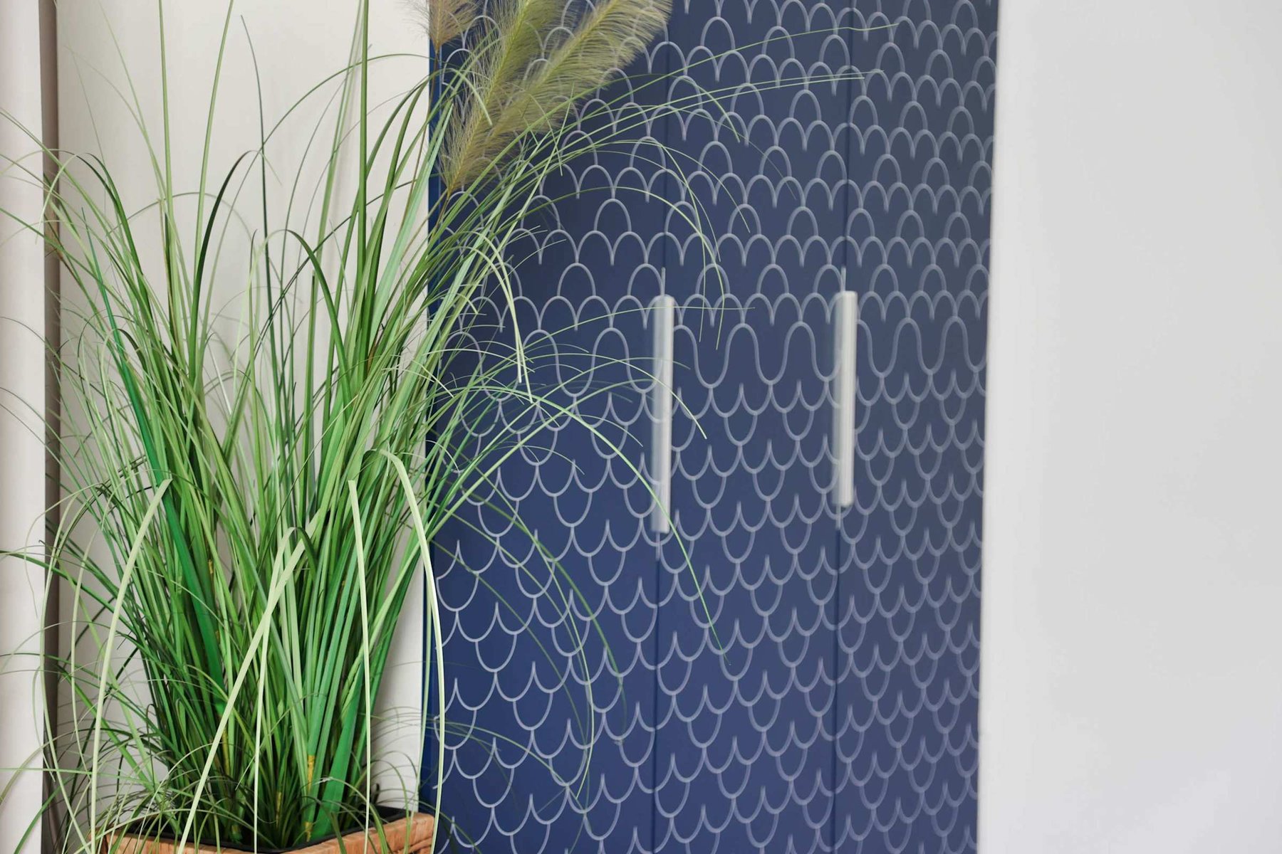 Fresh Decorative Touches | Stylish Wardrobe & Indoor Plant for a Modern Feel