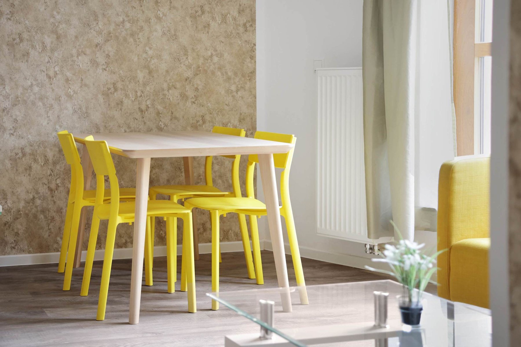 Bright dining nook | Cheerful table for four with natural light