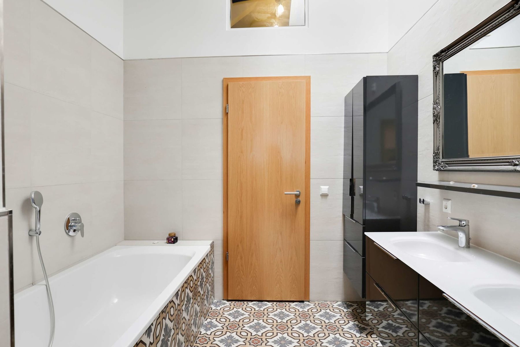 Elegant Bathroom | Patterned Floor Tiles, Dual Vanity & Bathtub Retreat