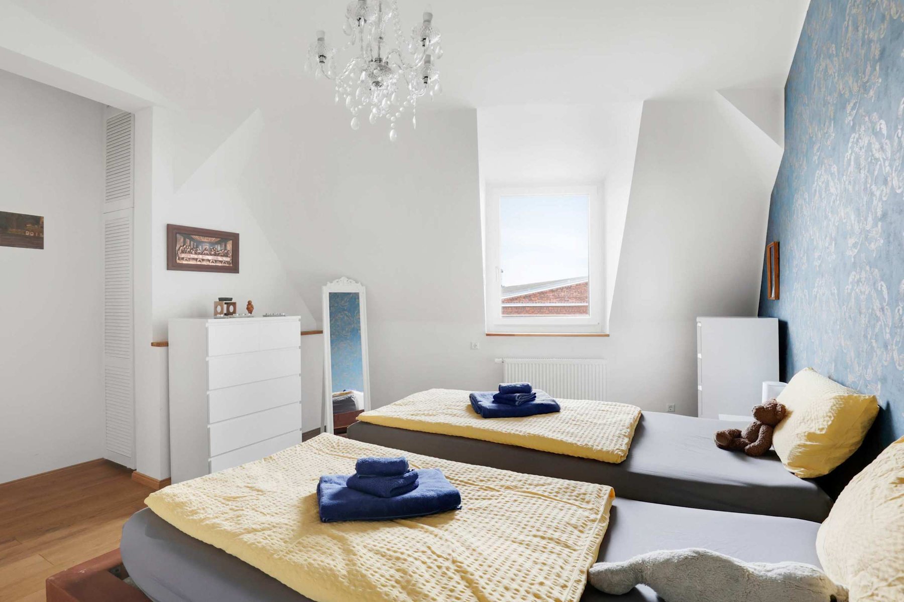Elegant Bedroom | King Bed & Cityscape Chandelier Glow