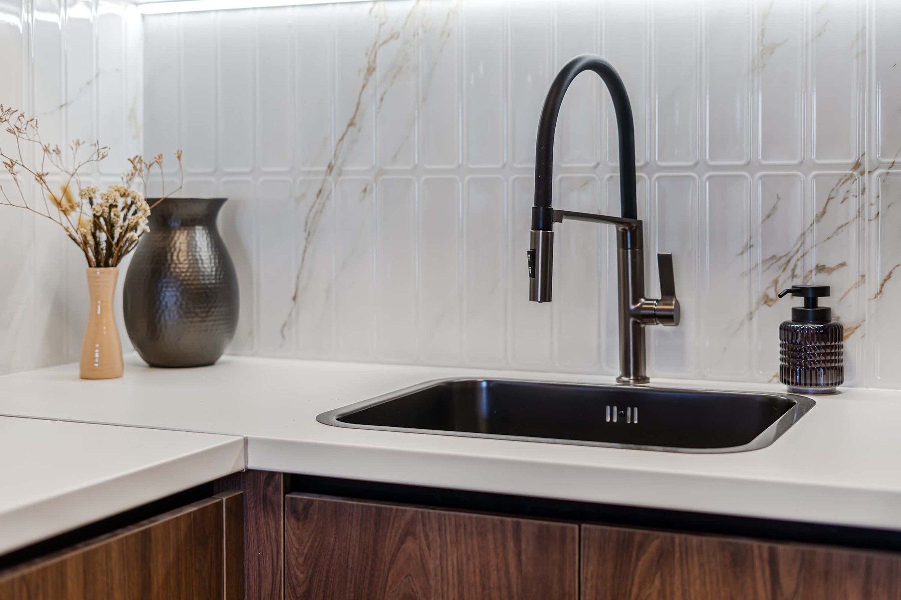 Sleek Black Sink & Tap with Marble Detail — Modern Functionality Meets Stylish Design in This Beautiful Kitchen Corner