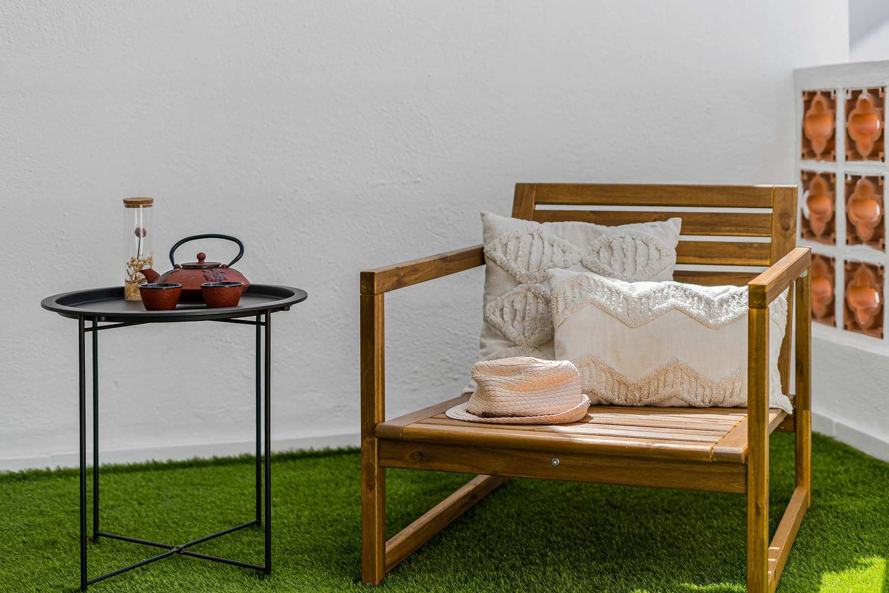 Sun-Kissed Terrace Chair with Soft Pillows — The Perfect Spot to Sip Tea, Read a Book, or Soak in the Peaceful Morning Light