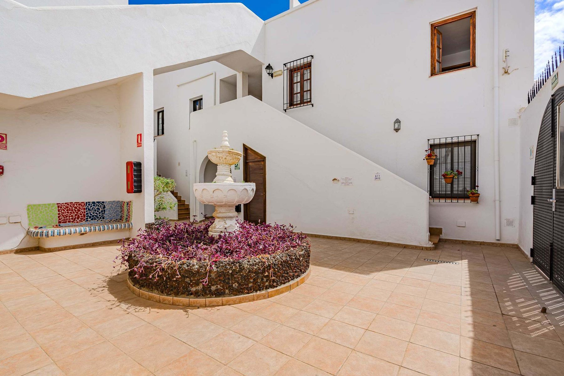Traditional Courtyard with Fountain — A Touch of Canary Island Character Welcomes You to Your Relaxing Stay