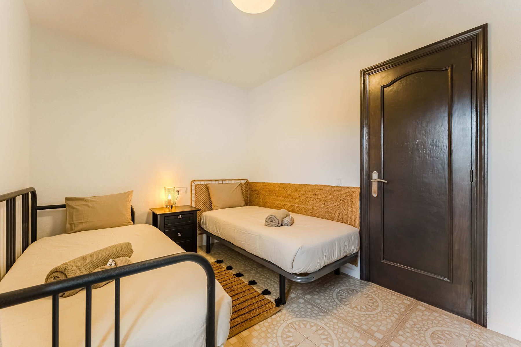 Second Bedroom Sleeps Two with a Relaxed Atmosphere, Soft Lighting & Warm Neutral Accents