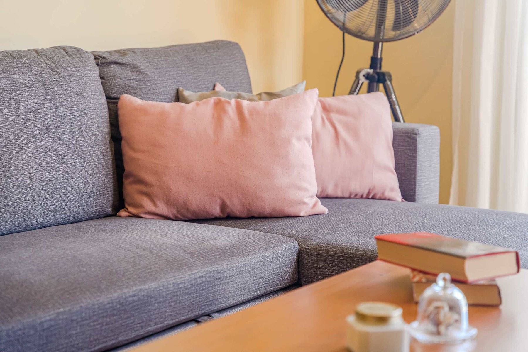 Cushioned Comfort – Lounge Area with Soft Textures & Sunset Ambience