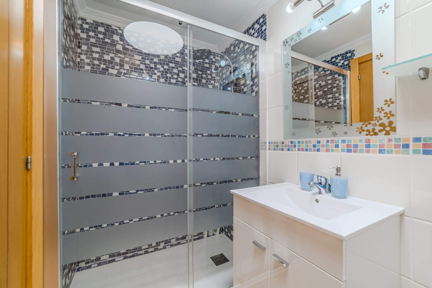 Modern Mosaic Bathroom with Walk-In Shower – Refresh After a Day in the Tenerife Sun