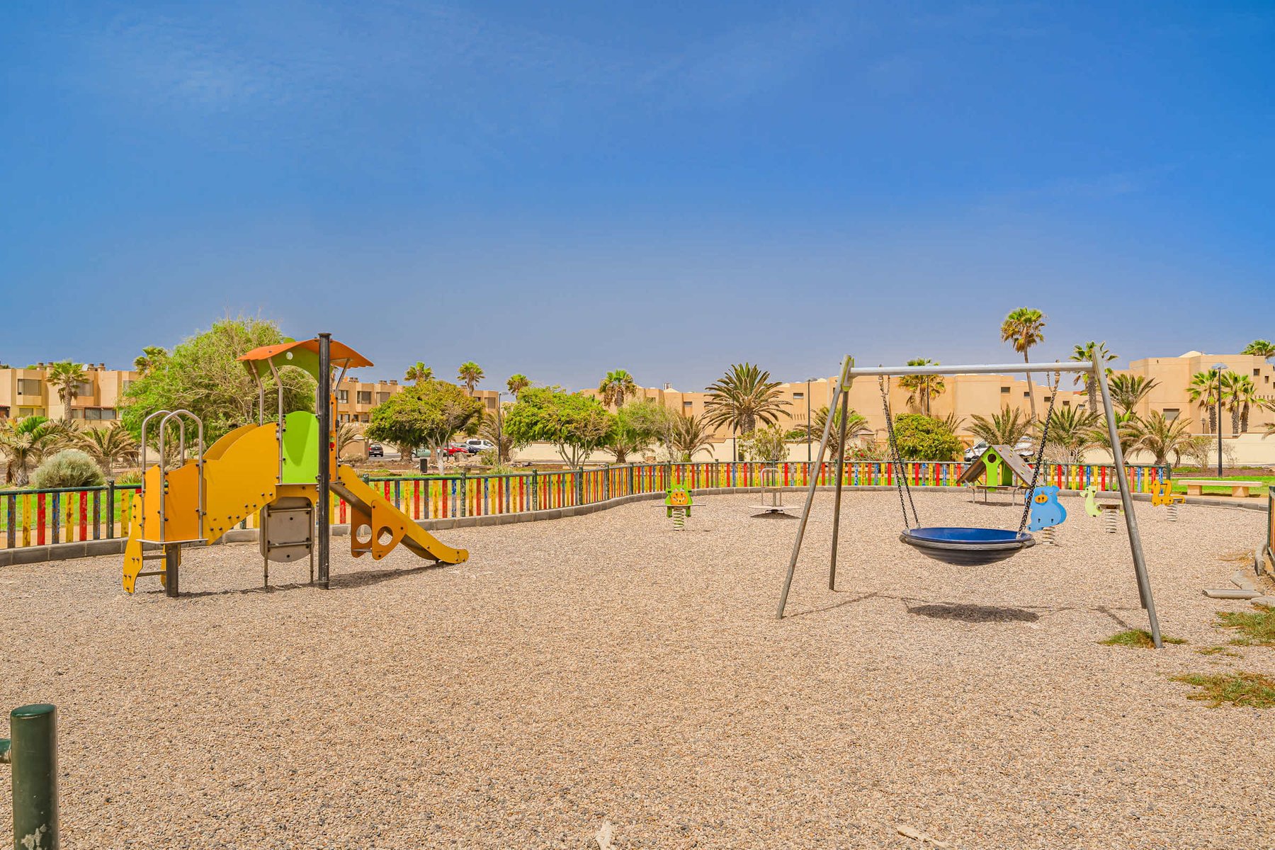 Family Playtime by the Sea – Colourful Playground Moments in the Sun