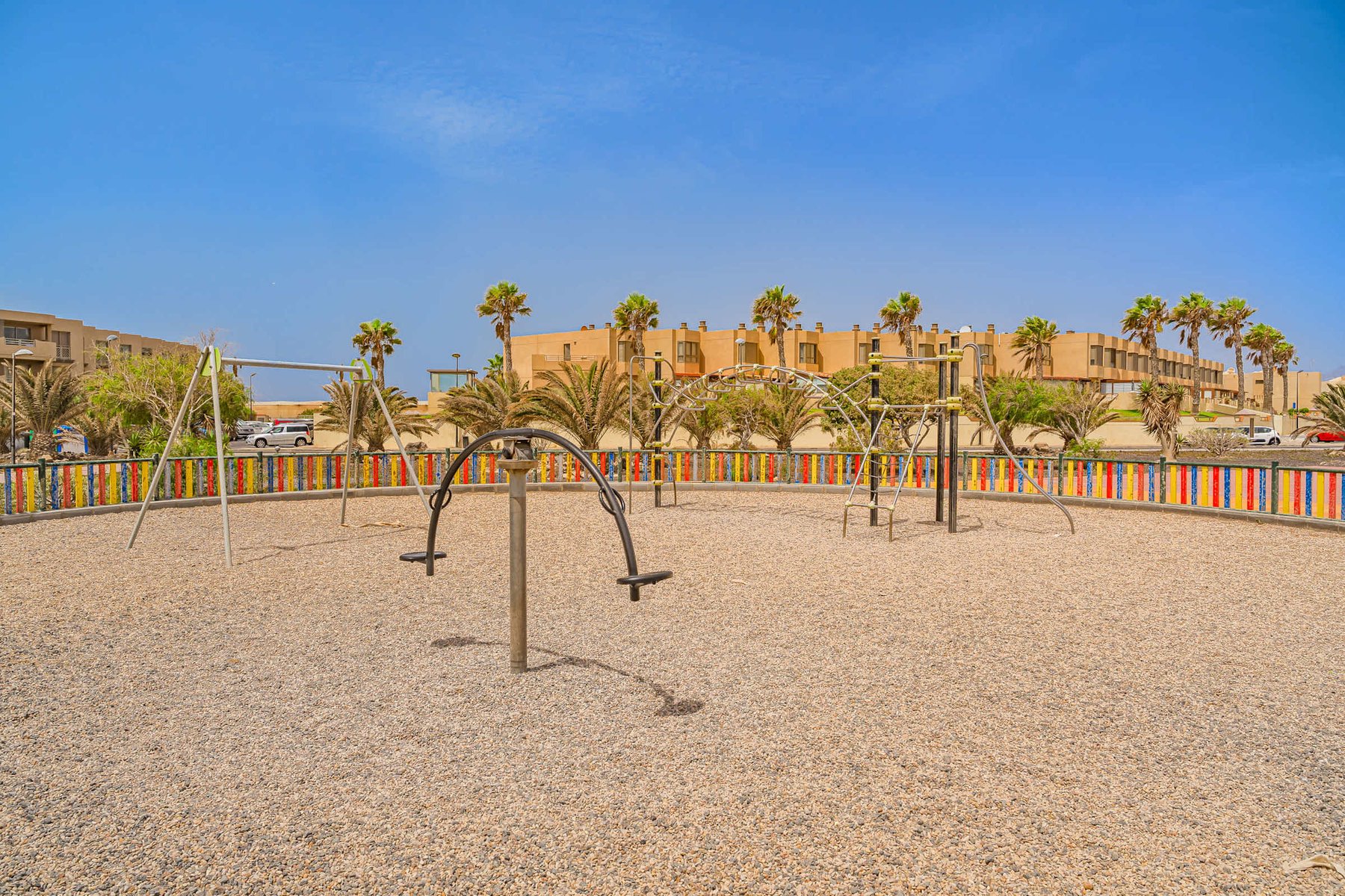 Family Playtime by the Sea – Colourful Playground Moments in the Sun