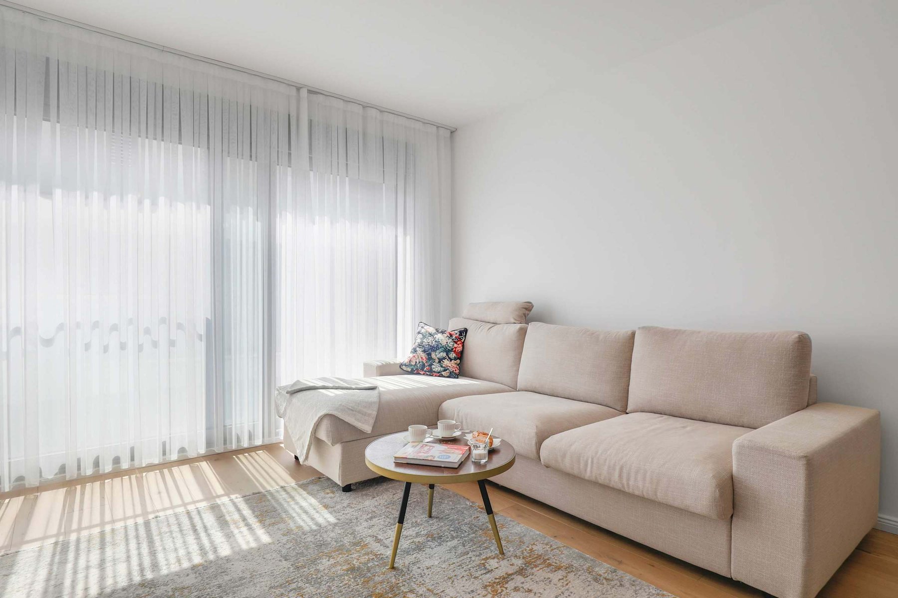 Sunlit Corner Sofa for Unwinding or Streaming — Lounge in Soft Light with Your Favourite Book or Series