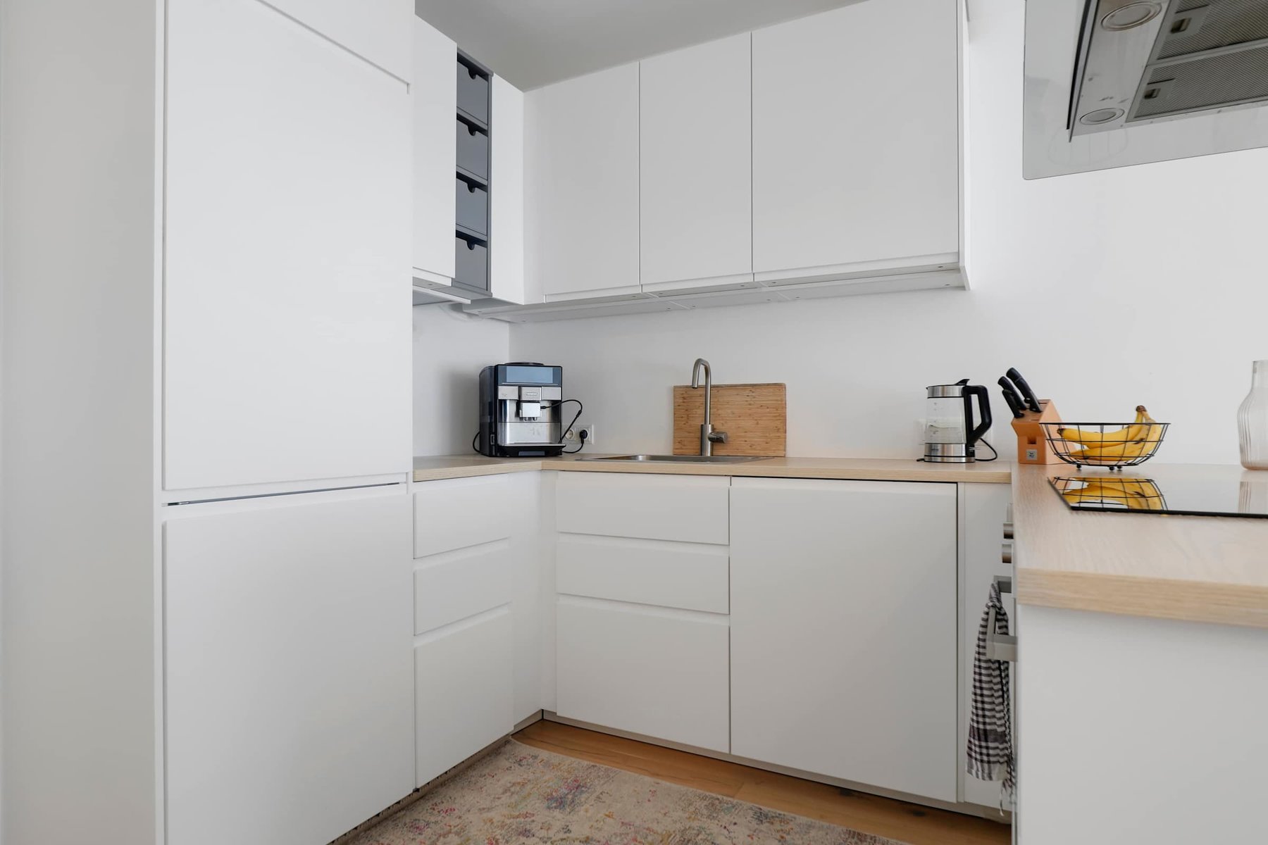 Modern Kitchen with Coffee Station, Premium Appliances, and Soft Lighting