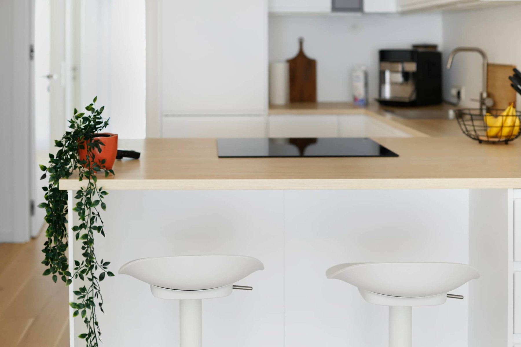 Airy Kitchen Island With Hanging Greenery