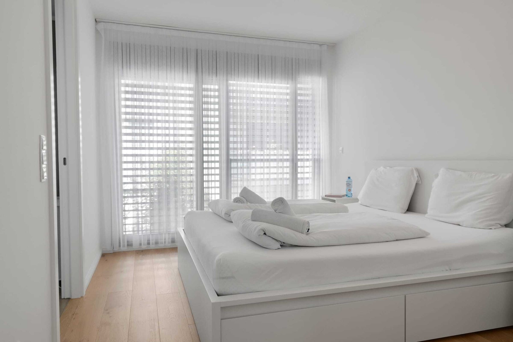 Peaceful Bedroom with Natural Light — Recharge Comfortably for Long-Term Stays in Vienna
