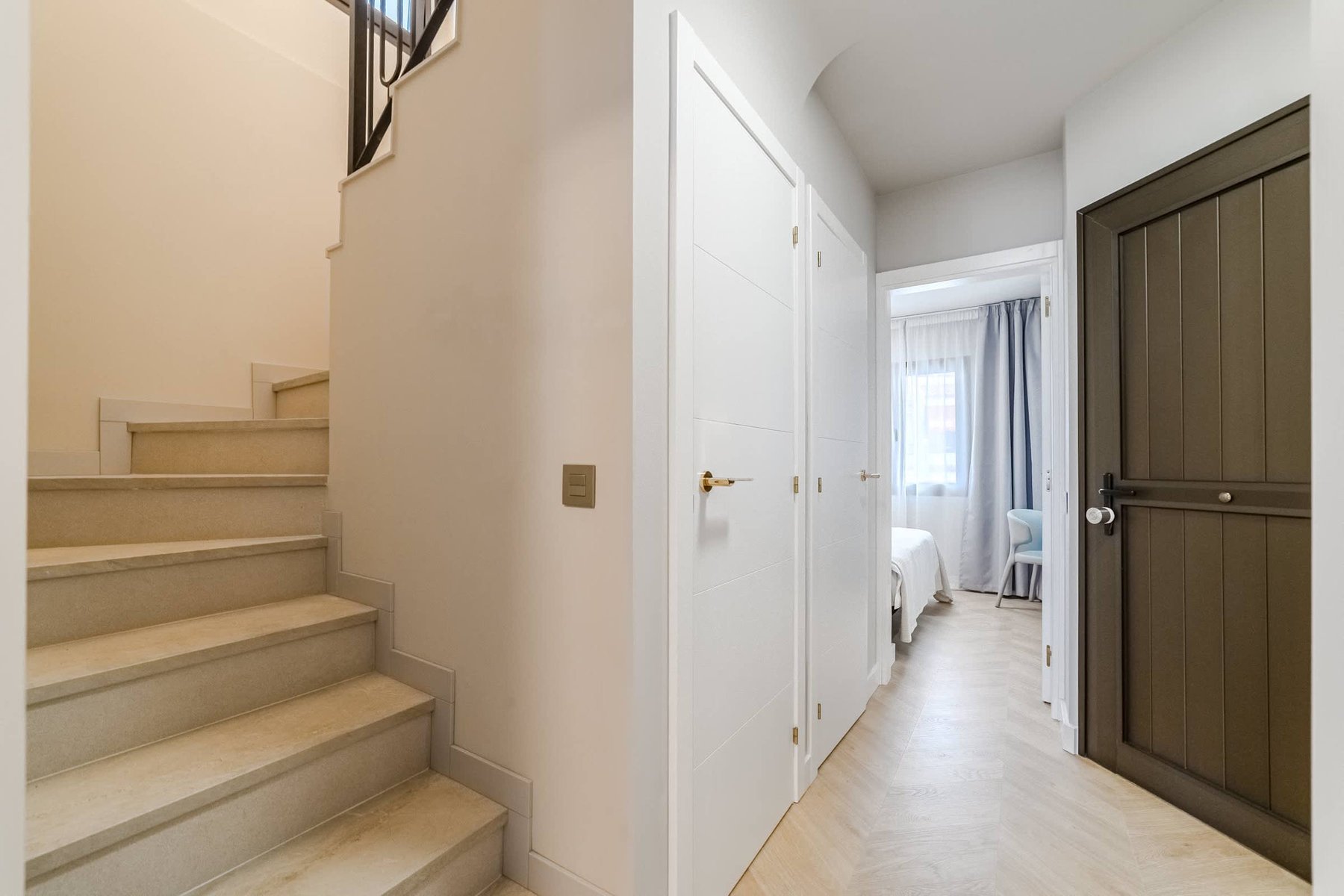 Elegant Stairway Access to Bedrooms – Spacious Holiday Apartment Living in Costa Adeje