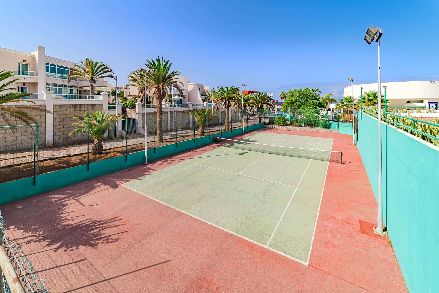 Tennis Court Fun – Enjoy a Match in the Sunshine During Your Holiday Stay