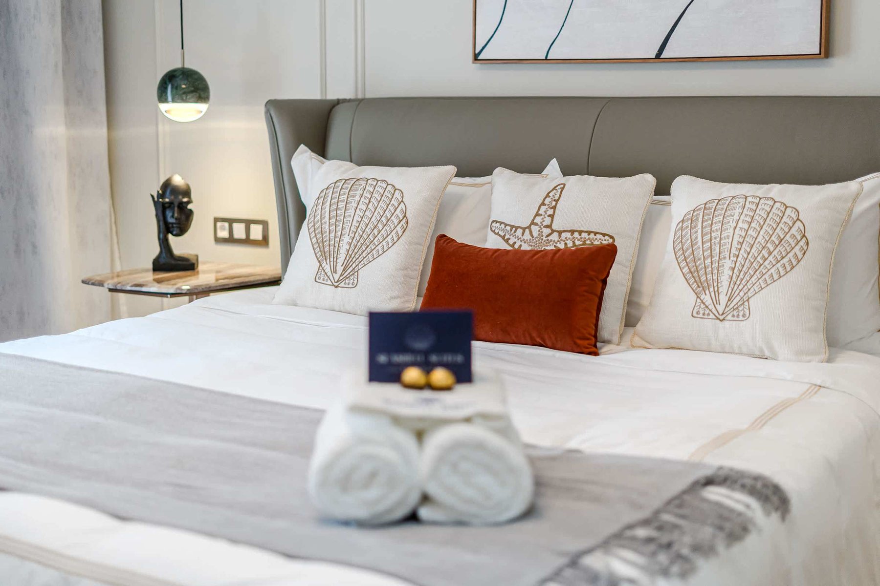 Artfully Curated Master Suite with King Bed — Sleep Under Elegant Lighting in a Space Designed for Serenity and Sophistication