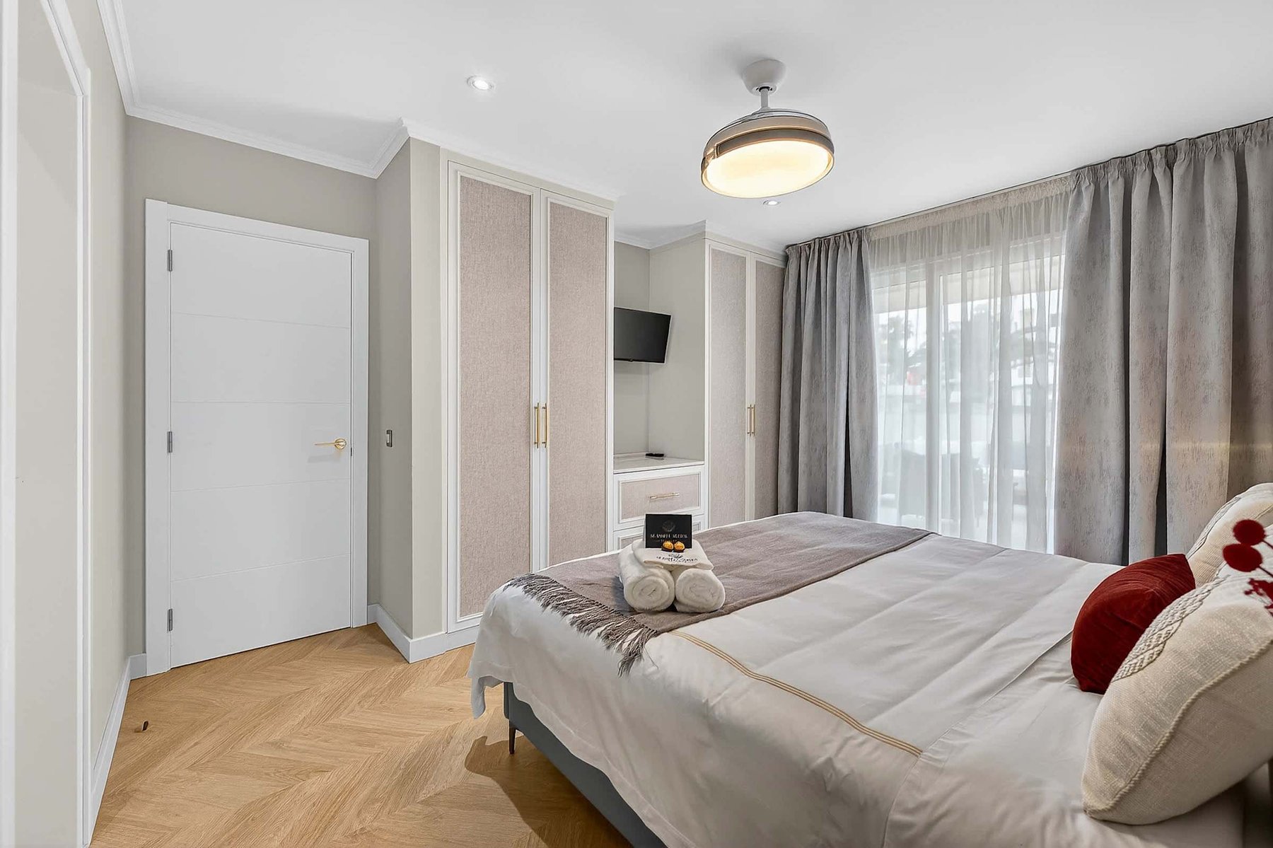 Artfully Curated Master Suite with King Bed — Sleep Under Elegant Lighting in a Space Designed for Serenity and Sophistication