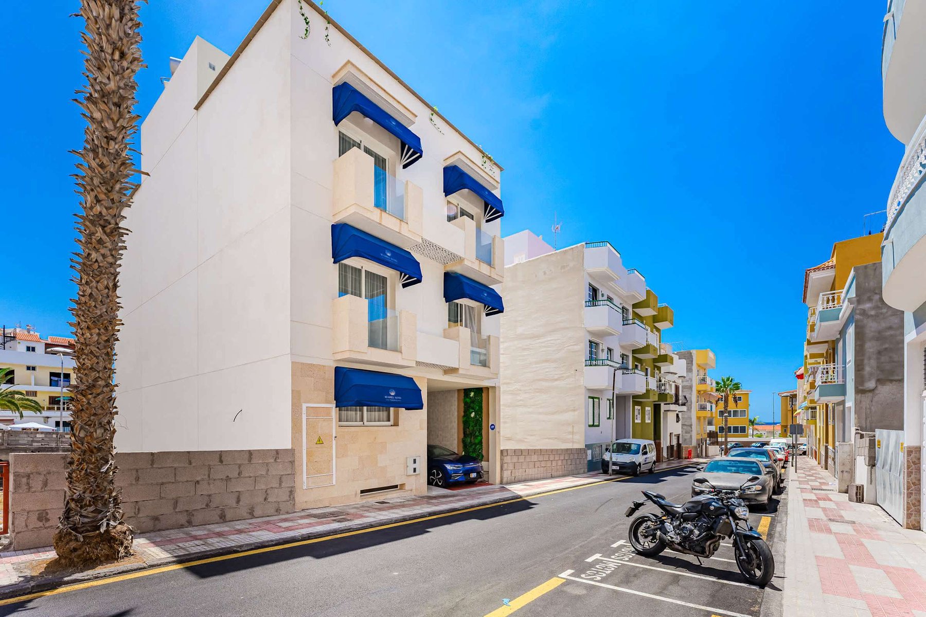 Boutique Coastal Facade – Arrive in Style to Your Modern Mediterranean Retreat in Playa San Juan