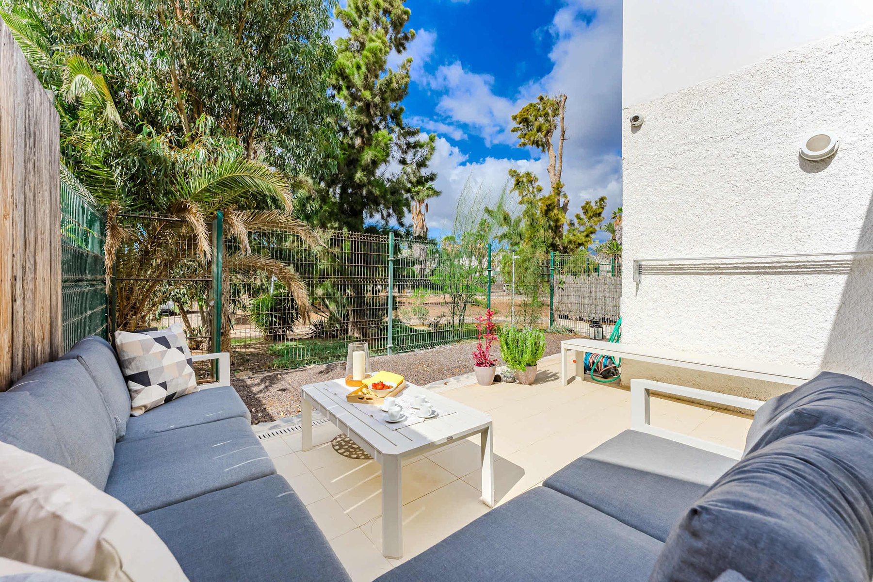 Ground Floor Garden Terrace with Cushioned Sofa and Patio Table – Enjoy Coffee Mornings or Sunset Aperitivos Surrounded by Nature